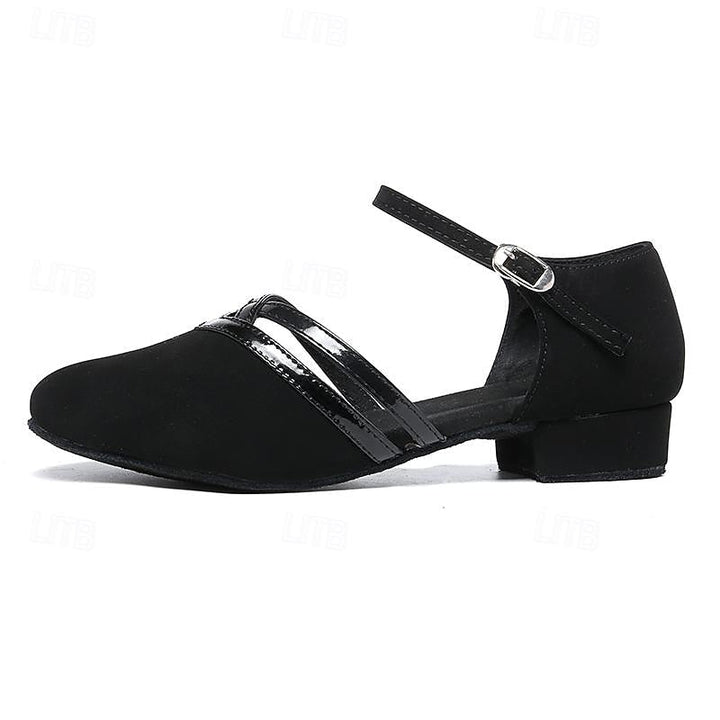 Elegant black women's ankle strap dance shoes, providing a secure fit for all dance styles.