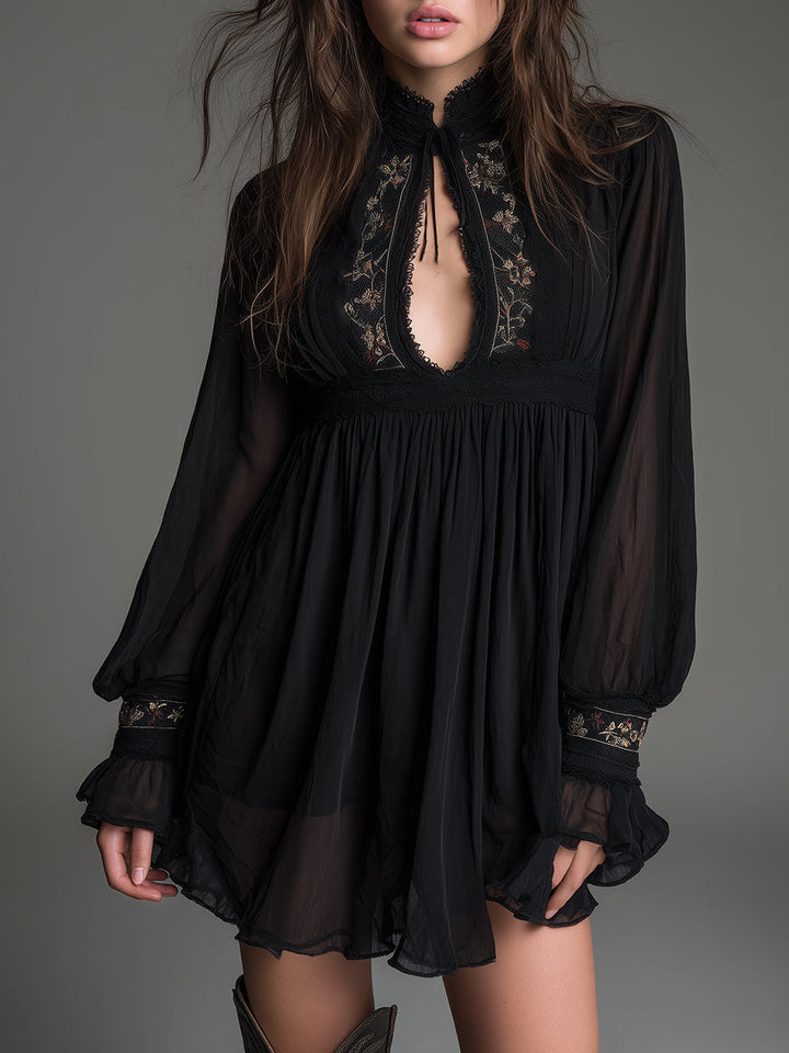 Women's black babydoll mini dress with high neck keyhole & balloon sleeves. Perfect for elegant party or date night.