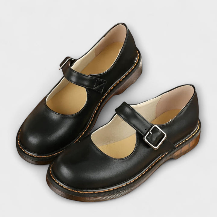 Stylish women's Mary Jane flats with a trendy chunky sole and buckle strap, versatile for any outfit.
