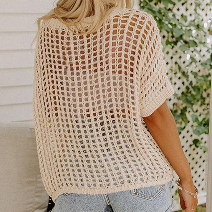 Casual women's fishnet knit short sleeve tee. Versatile mesh top for summer fashion and layering.