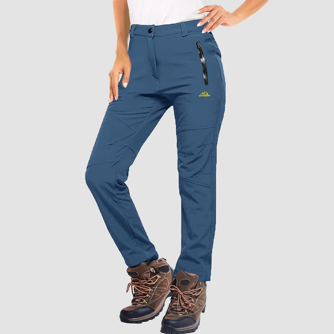 Women's warm fleece-lined ski pants, featuring a comfortable and flexible design for winter