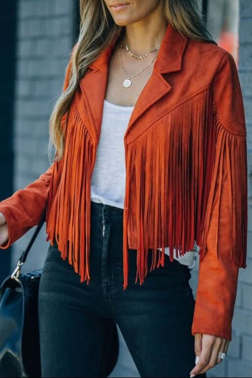 Women's black fringed moto jacket, perfect for an edgy biker style. Unleash your bold fashion statement.
