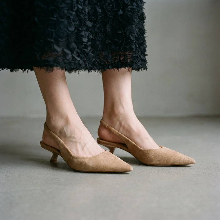 Women's black kitten heel slingback sandals with pointed toe. Elegant & stylish for office wear or evening events.