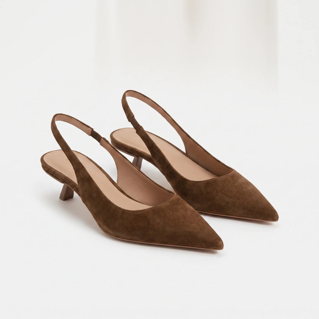 Women's pointed toe kitten heel slingback sandals. Comfortable & stylish slip-on heels for formal or evening wear.