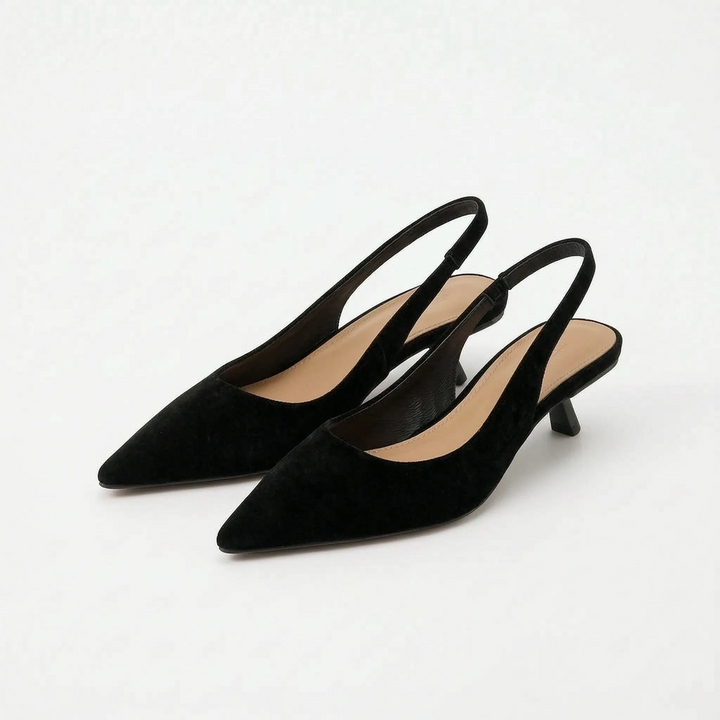 Modern women's kitten heel slingback sandals. Elegant pointed-toe heels, comfortable for office and evening events.