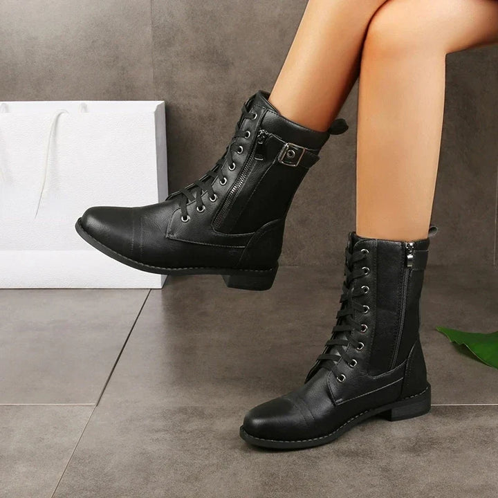 Comfortable women's ankle boots; black, lace-up style with secure zipper & durable rubber sole.
