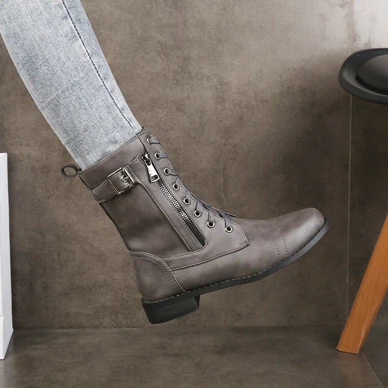 Everyday women's lace-up ankle boots. Features a sturdy zipper, durable sole & comfortable fit.