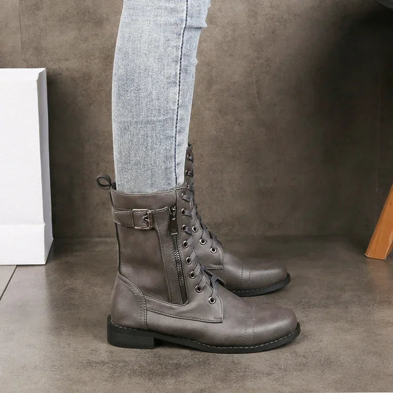 Versatile women's boots: lace-up front, convenient side zipper, durable sole for all-day comfort.