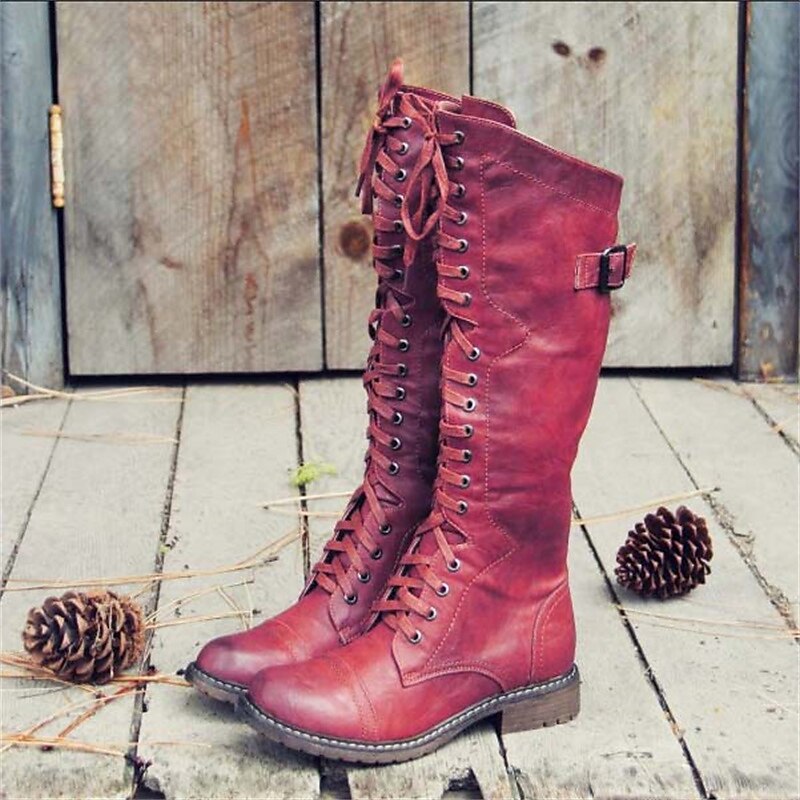 Stylish women's casual knee-high boots with elegant lace-up design, ideal comfortable footwear for autumn.