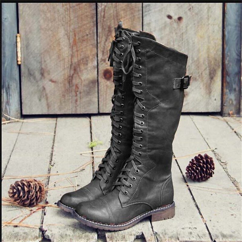 Classic women's knee-high riding boots with lace-up front, versatile everyday footwear for fall & winter.