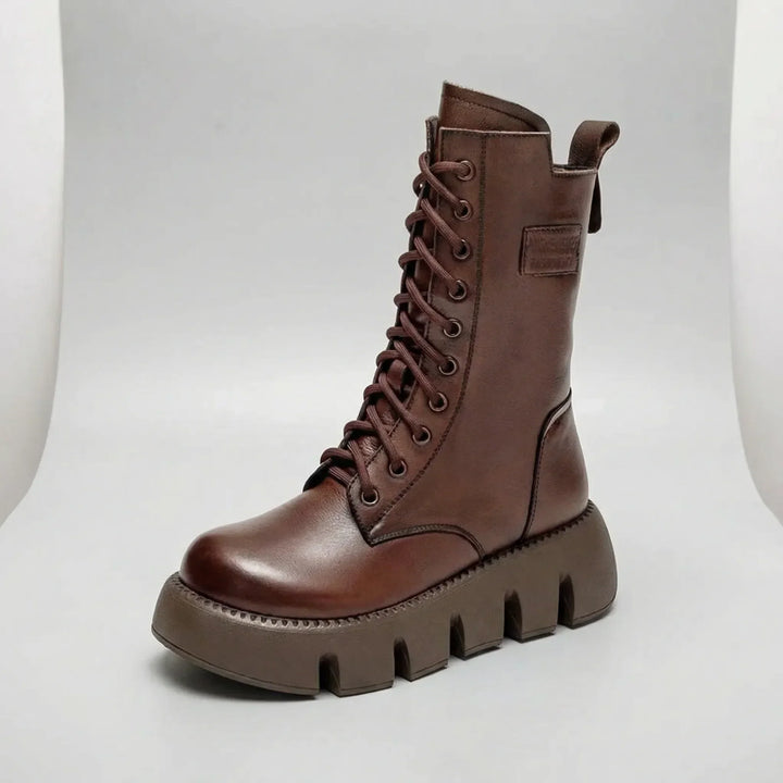 Women's comfortable arch support lace-up combat boots, black platform design, ideal for edgy everyday style.