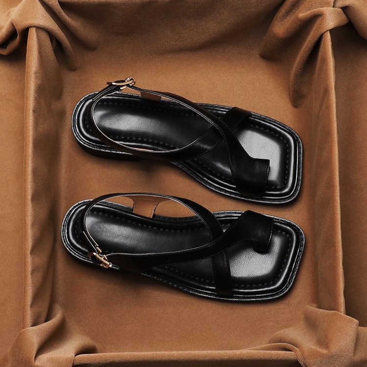 Pair of women's comfort sandals made of genuine leather with refined cross straps