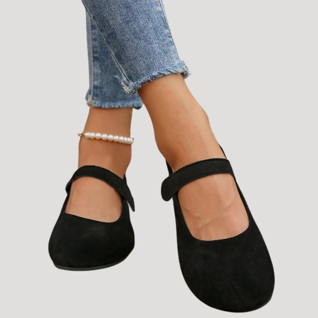 Classic women's round-toe Mary Jane flats, comfortable for everyday wear, easy slip-on.