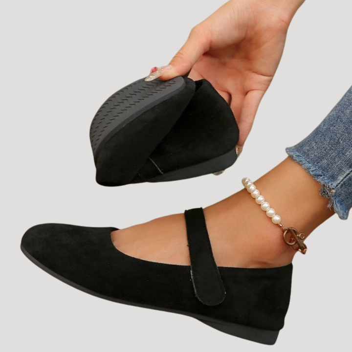 Everyday women's slip-on Mary Jane flats featuring a round toe and convenient Velcro closure.