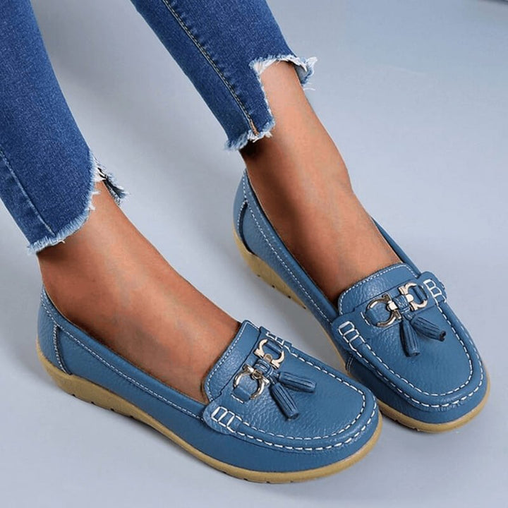 Supportive orthopedic women's loafers. Stylish slip-on flats offering comfort & relief for daily walking.