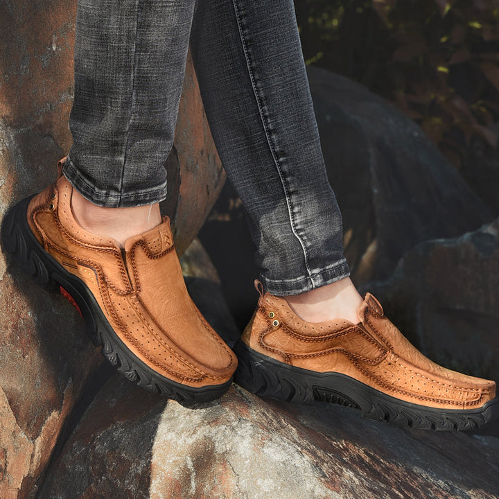 Women's orthopedic black leather ankle boots, providing comfortable and stable walking experience
