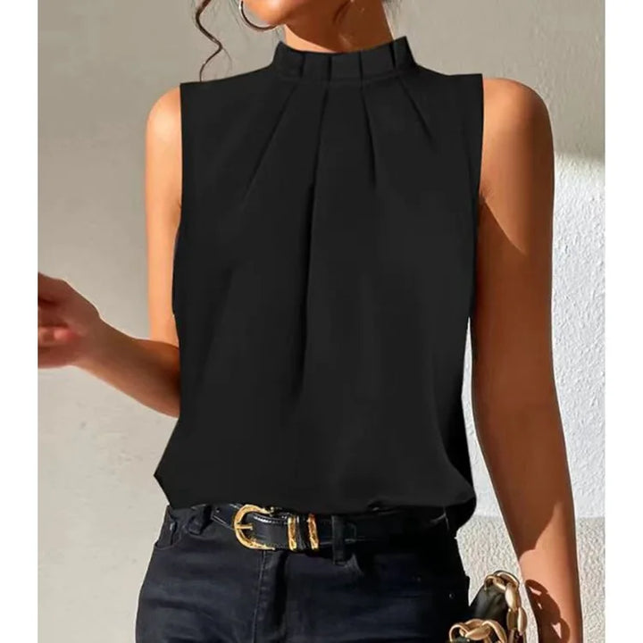 Women's black pleated casual top, elegant and versatile for office wear or chic spring/summer fashion.