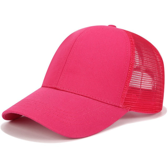 Black women's high ponytail baseball cap by SkyShield. Adjustable design for high buns, sports, and sun protection.