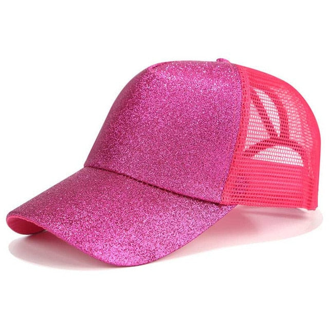 Black baseball cap for women, featuring a high ponytail/bun opening. Adjustable for comfort & sun protection.