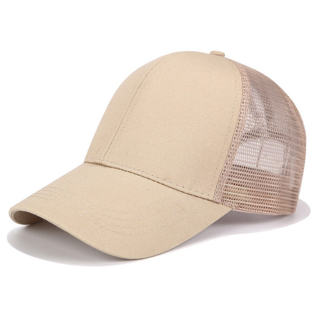 Women's black baseball cap with a unique high ponytail opening. Adjustable for perfect fit, offers sun protection.