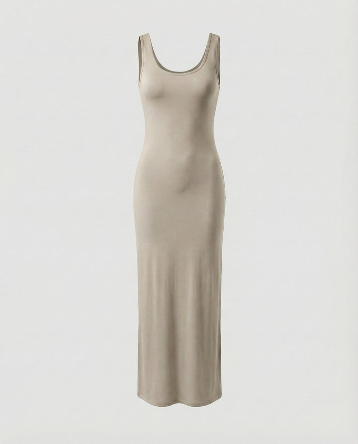 Woman in scoop neck sleeveless bodycon maxi dress, showing comfortable movement & style.