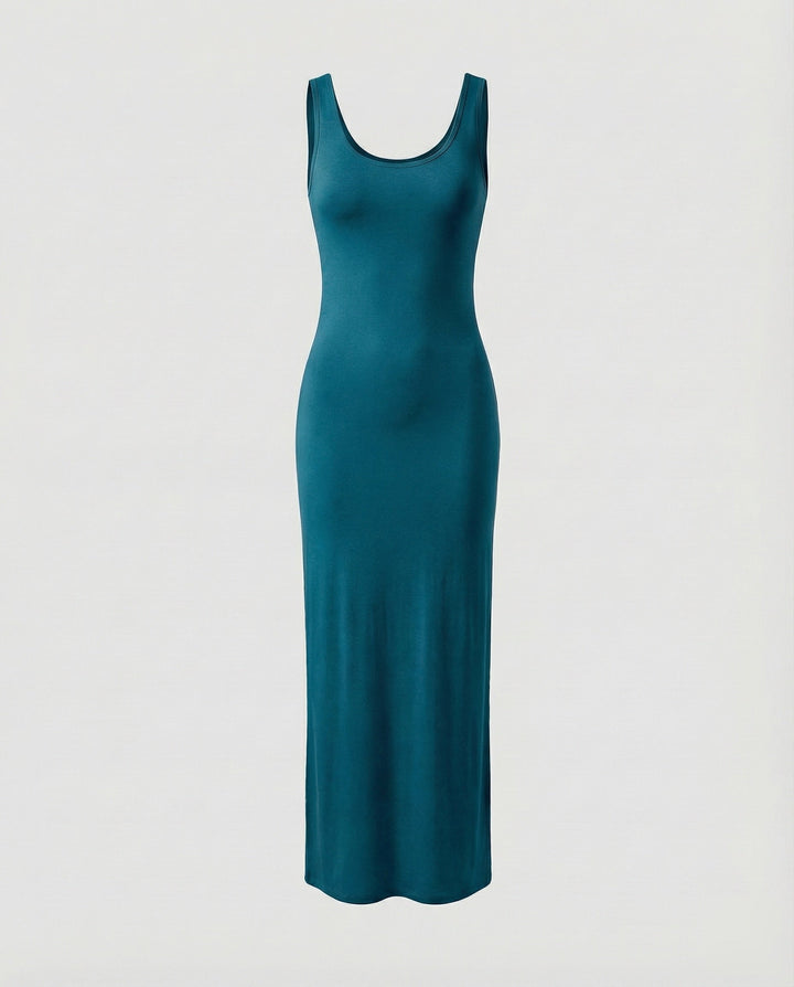 Woman modeling stylish scoop neck sleeveless bodycon maxi dress, showcasing its flattering fit.