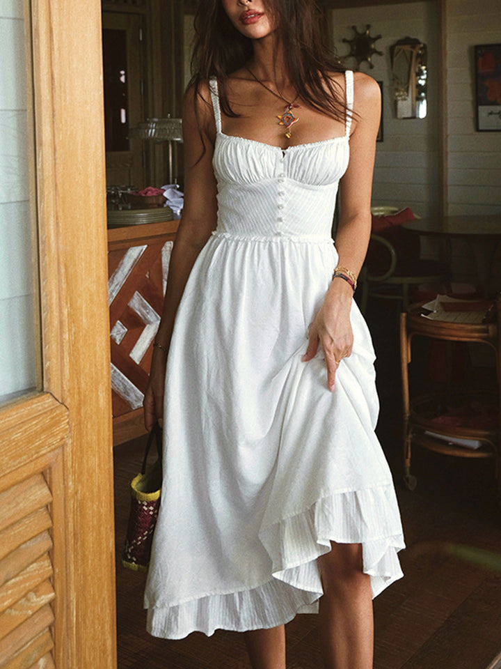 Chic women's sleeveless midi dress featuring a flattering ruffle hem, a versatile cami style.