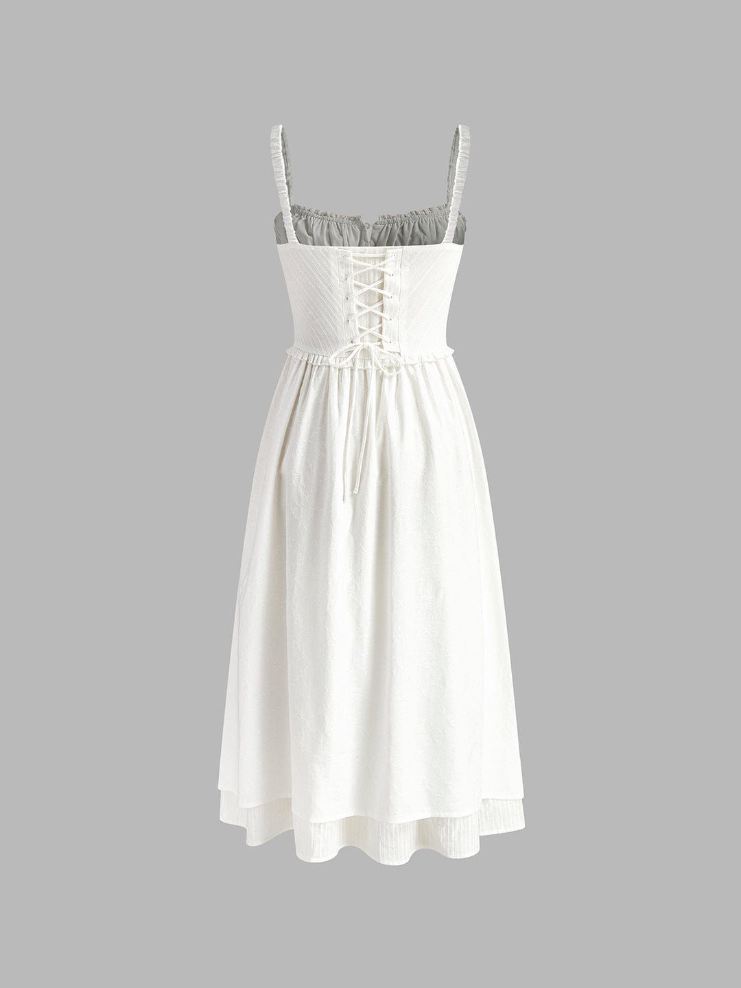 Women's black sleeveless cami midi dress with a flowing ruffle hem, ideal for elegant wear.