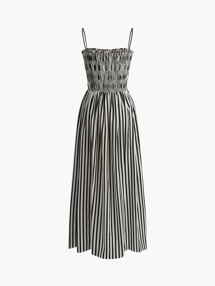 Women's black pinstripe smocked maxi dress, strappy A-line style, ideal for summer, spring, or holiday wear.