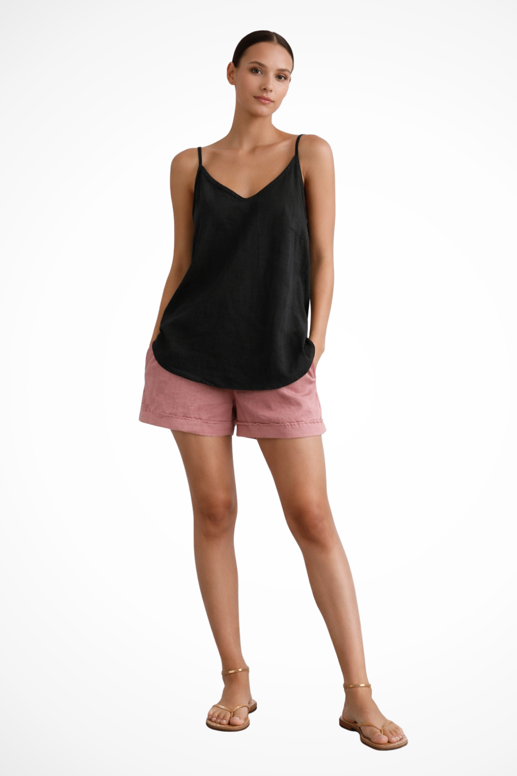 White women's spaghetti strap V-neck cami top. A chic, lightweight summer top for casual or everyday outfits.