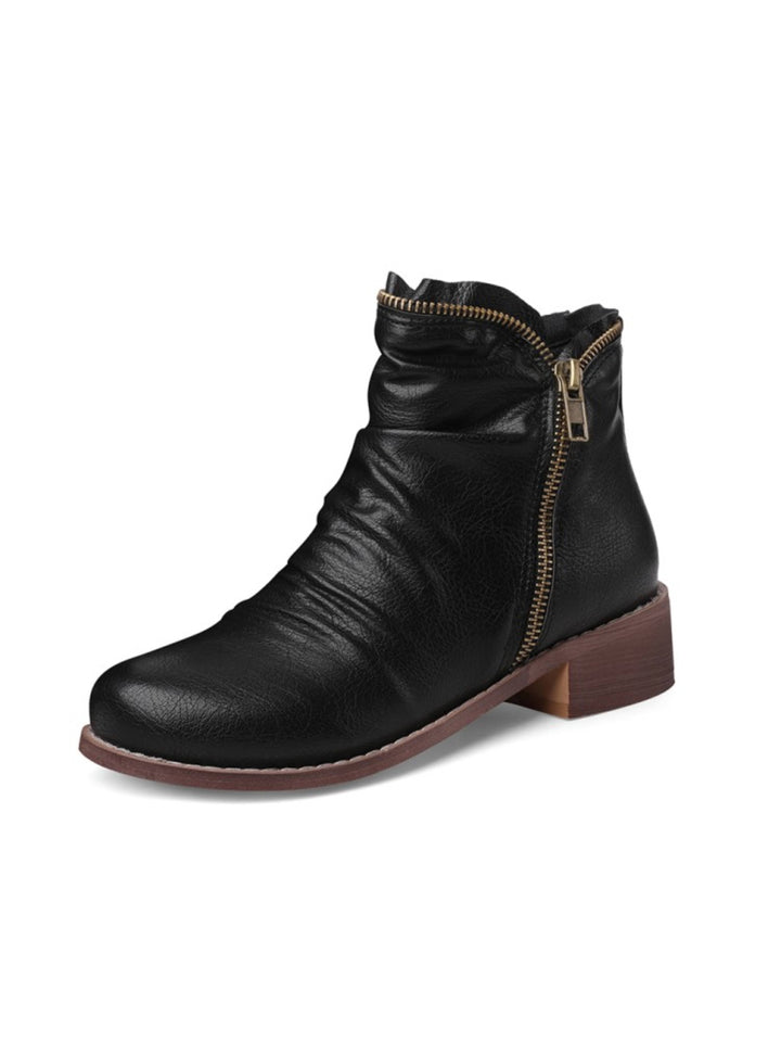 Women's black wrinkled western ankle boots with double zip, low heel & round toe.