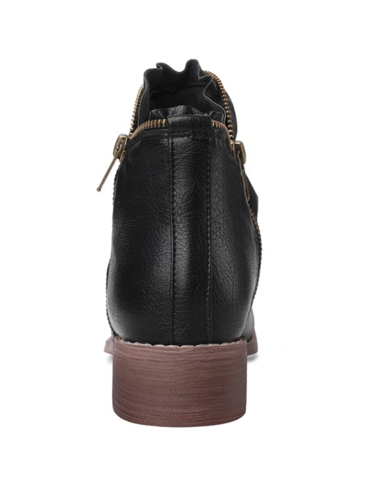 Fashionable women's round toe black boots. Low western heel, wrinkled texture, & double zip.
