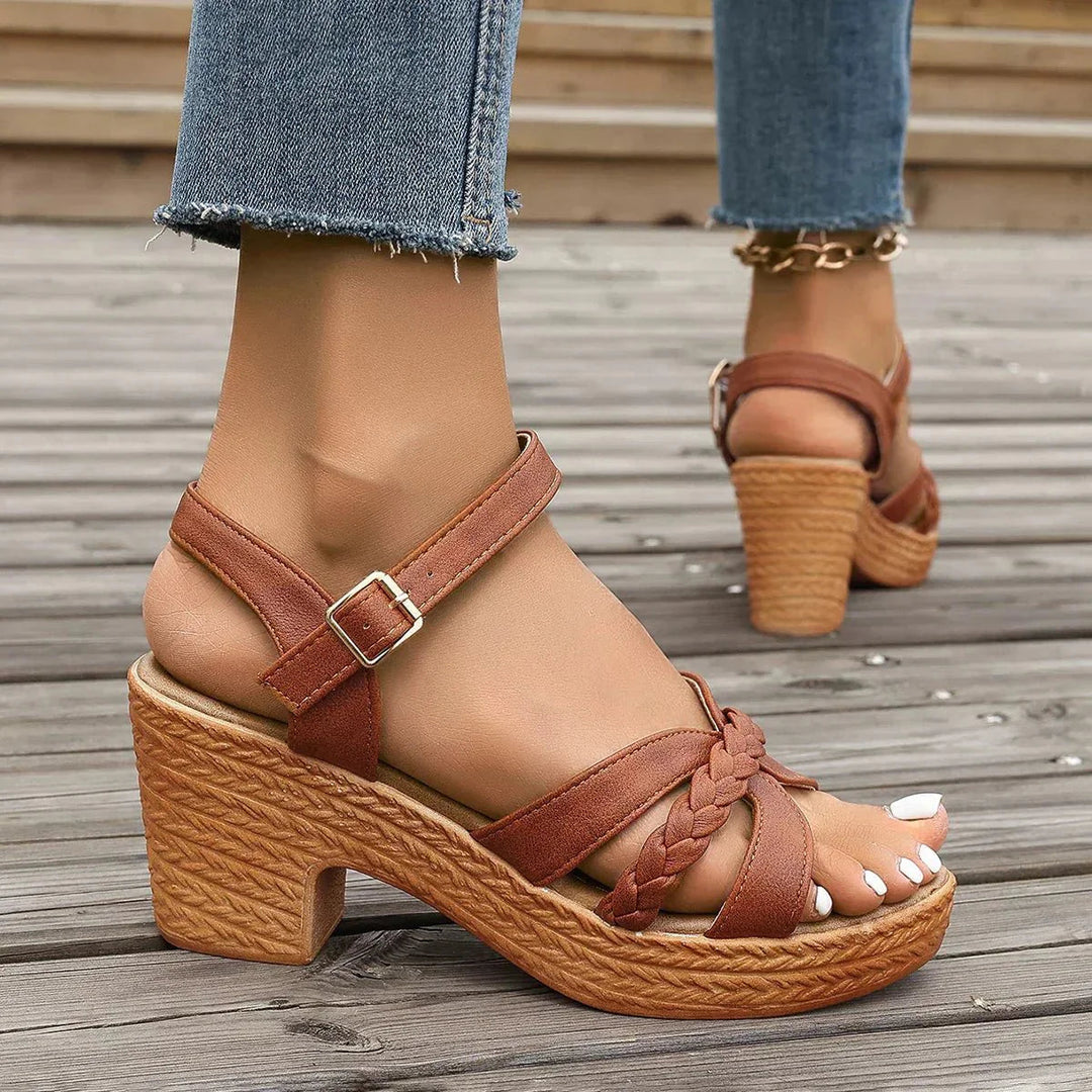 Comfortable women's platform block heel sandals with secure ankle strap for stylish summer fashion.
