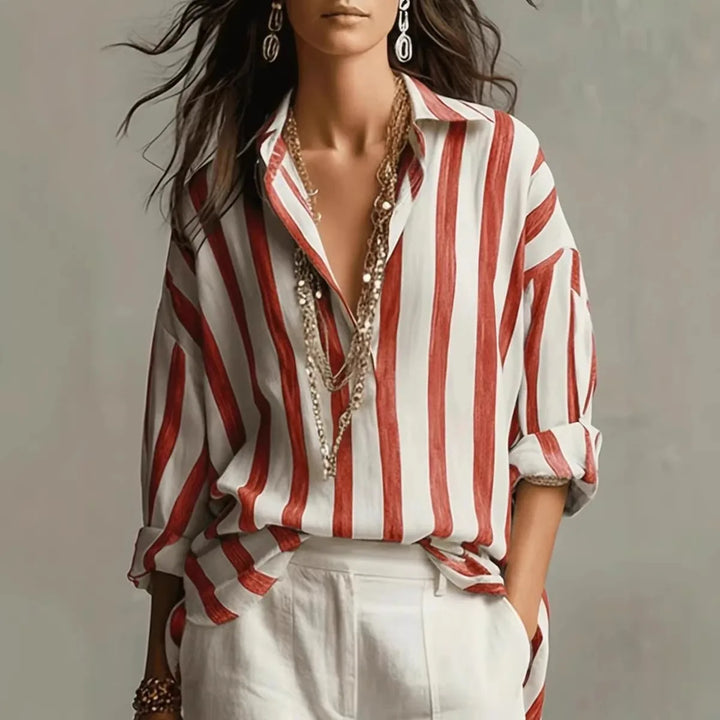 Flowy women's striped long sleeve shirt with classic button-down front. Stylish & comfortable for everyday fashion.