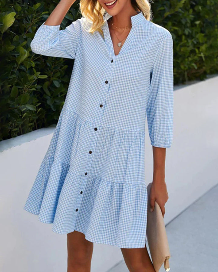 Women's blue check tiered summer dress with short sleeves & practical button details. Light & airy.