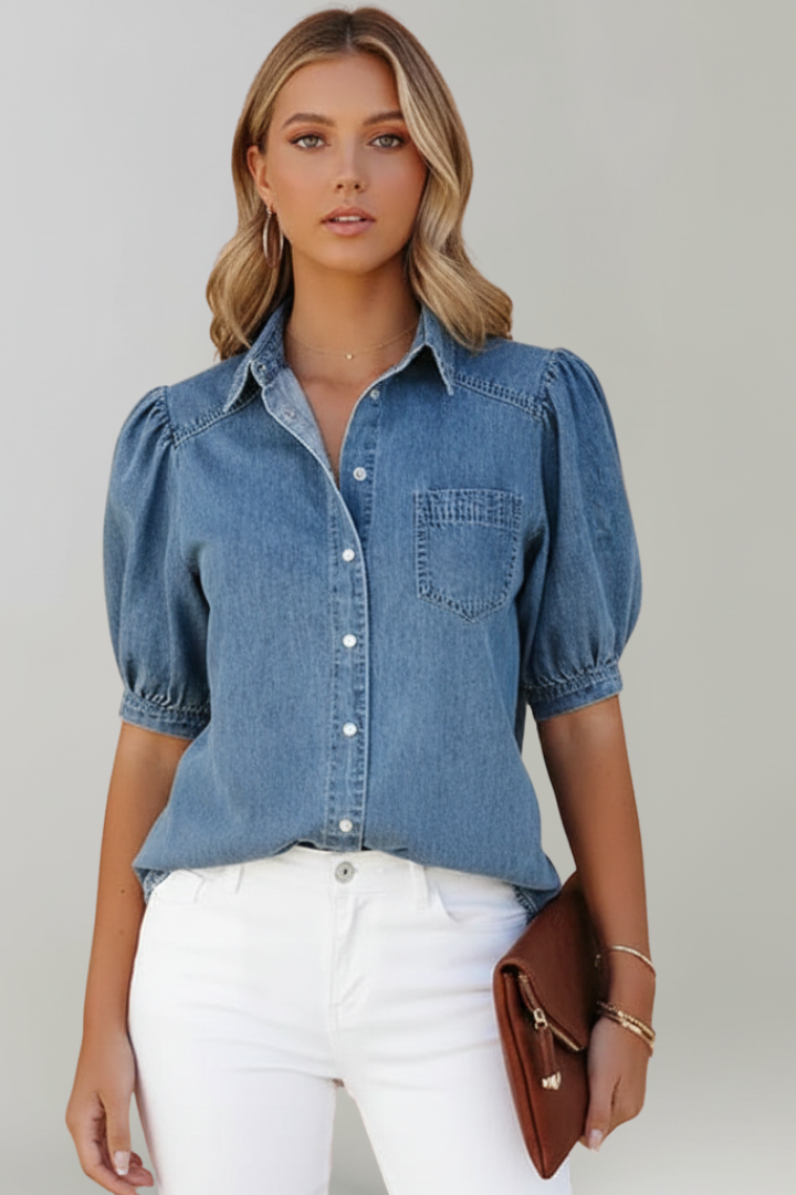 Stylish women's blue puff sleeve shirt in a relaxed, loose fit. Perfect button-up top.