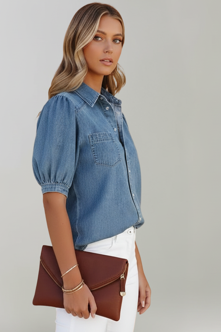Casual women's blue puff sleeve button-up shirt. Loose fit blouse, a stylish fashion top.
