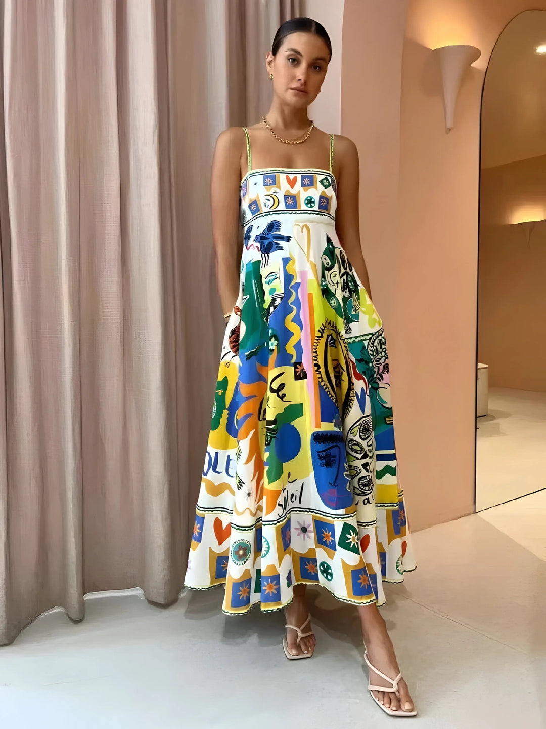 Women's blue square neck midi dress with flowing summer style. Comfortable, elegant, and versatile for day to night wear.