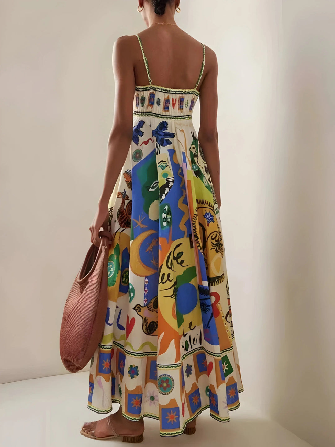 Elegant blue women's midi dress featuring a stylish square neck and flowing silhouette, perfect for comfortable summer days.
