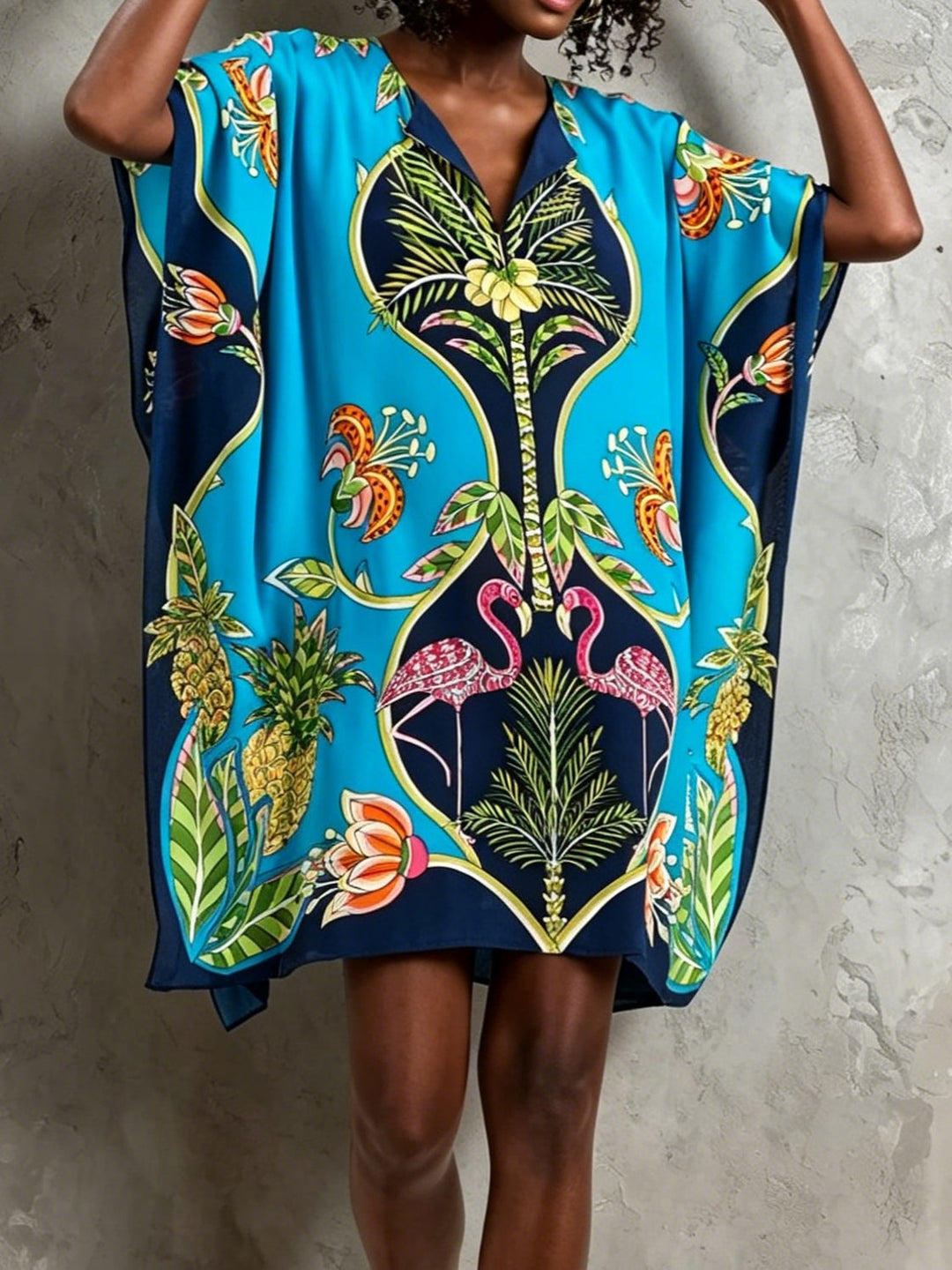 Elegant women's V-neck blue tropical midi dress, a perfect flowing resort style for summer and vacation.