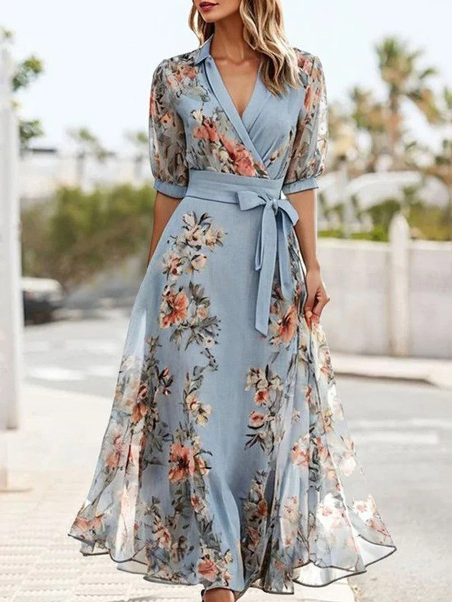 Women's blue V-neck wrap maxi dress with short sleeves, elegant and flowy, ideal for summer & spring casual wear.