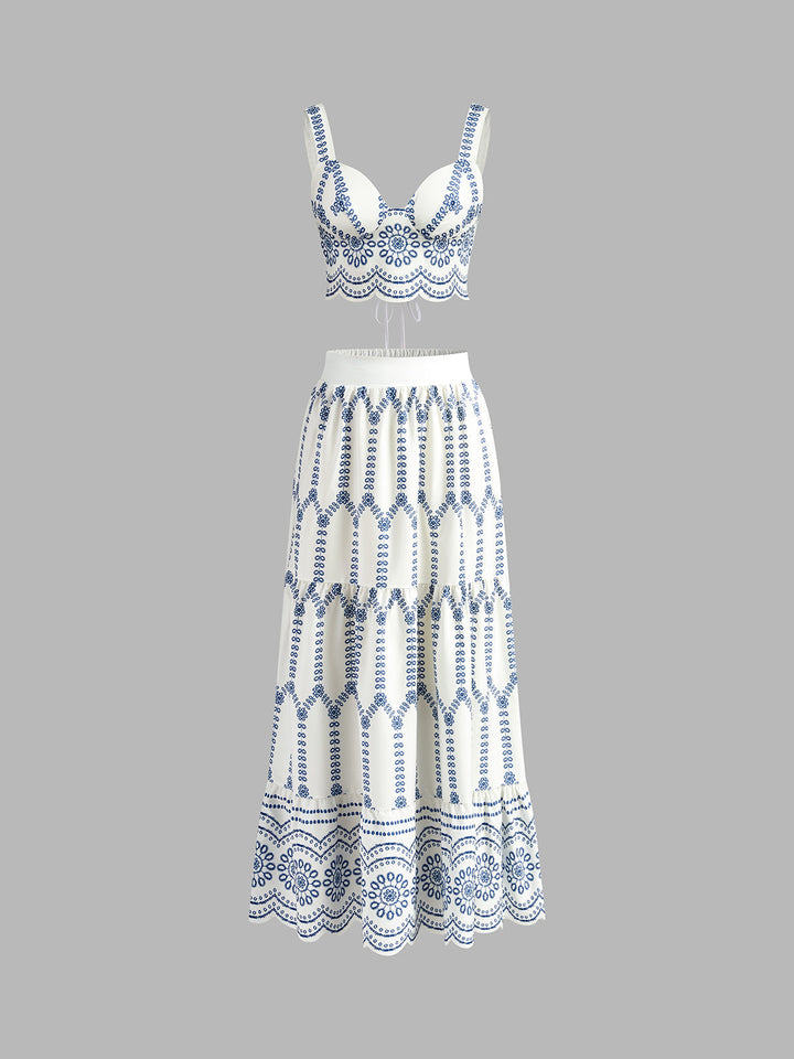 Women's blue & white printed sleeveless tie-back top and matching midi skirt set. Ideal summer vacation outfit.