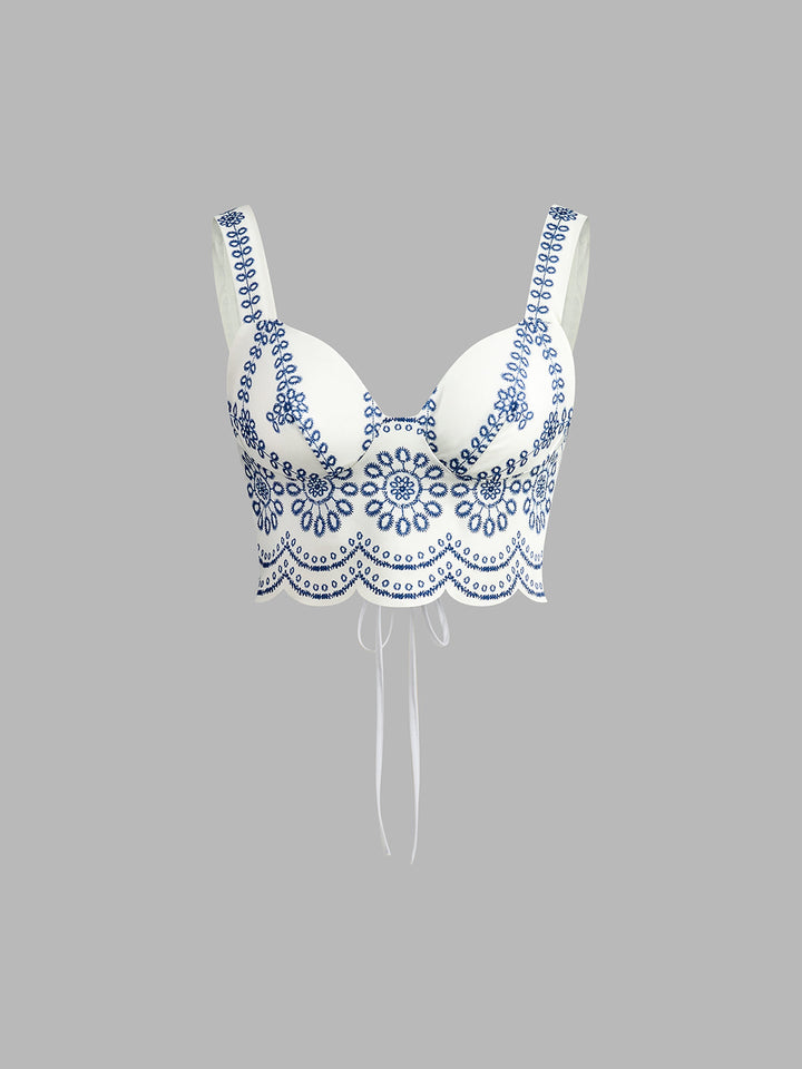 Trendy women's 2-piece printed skirt set with sleeveless tie-back top. Perfect for chic summer vacations & casual wear.