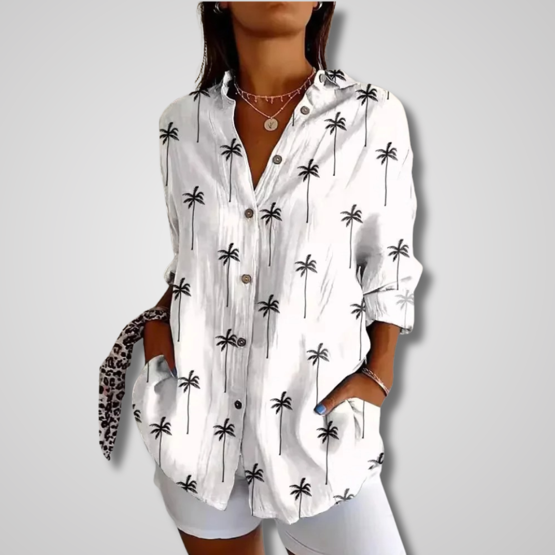 Fashionable women's printed top with a bohemian artistic design & button-up front. Perfect for boho chic style.
