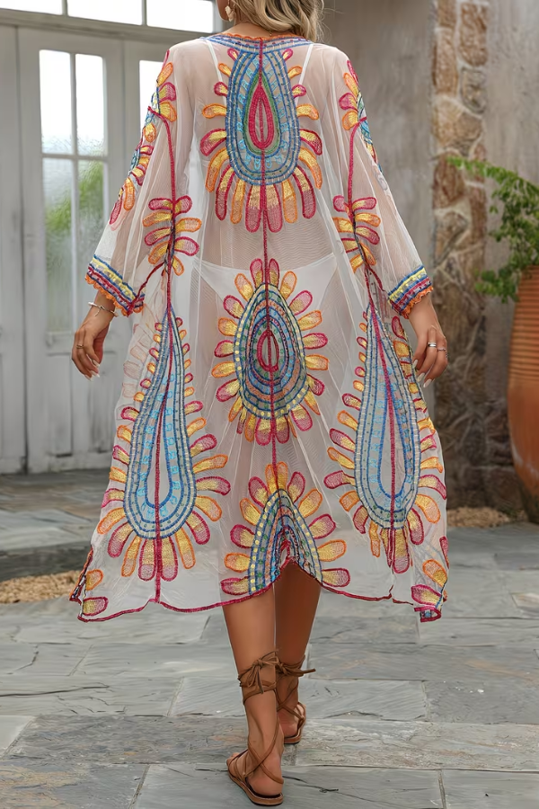 Semi-sheer floral bohemian kimono cover-up for women's swimwear, great for vacation style.