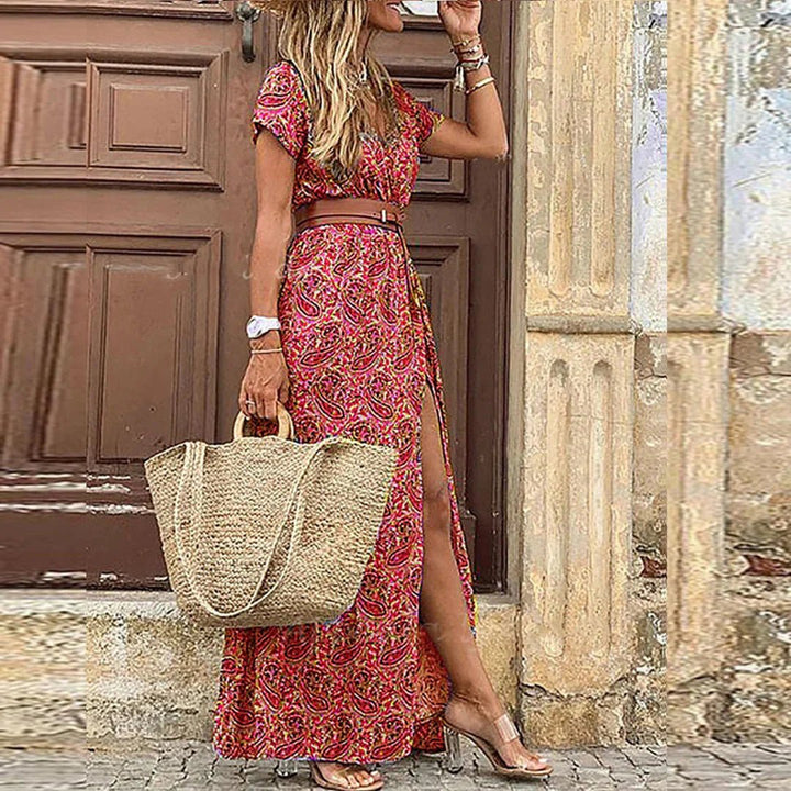 Light, flowy women's bohemian floral maxi dress. V-neck, sleeveless, side split. Ideal for casual summer vacation.