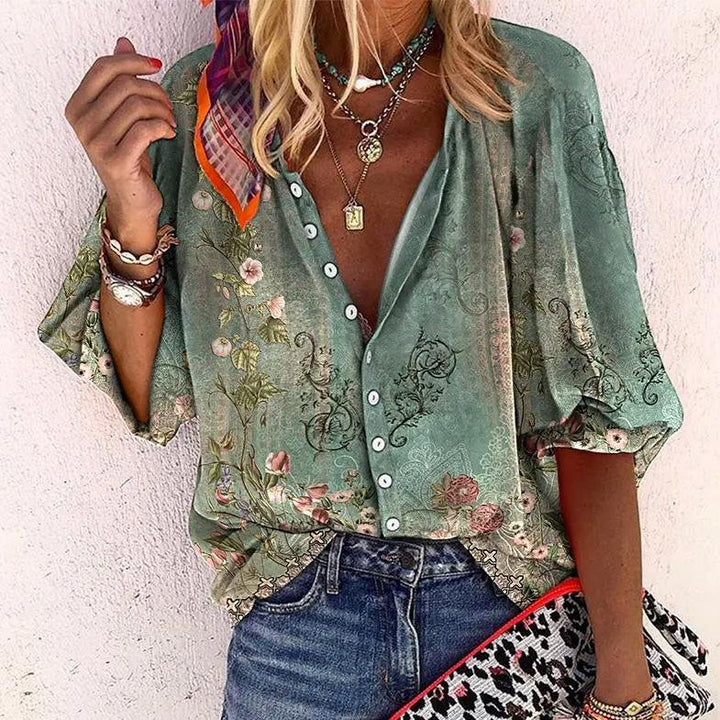 Women's bohemian floral v-neck blouse with short sleeves and button front, perfect for casual spring and summer wear.