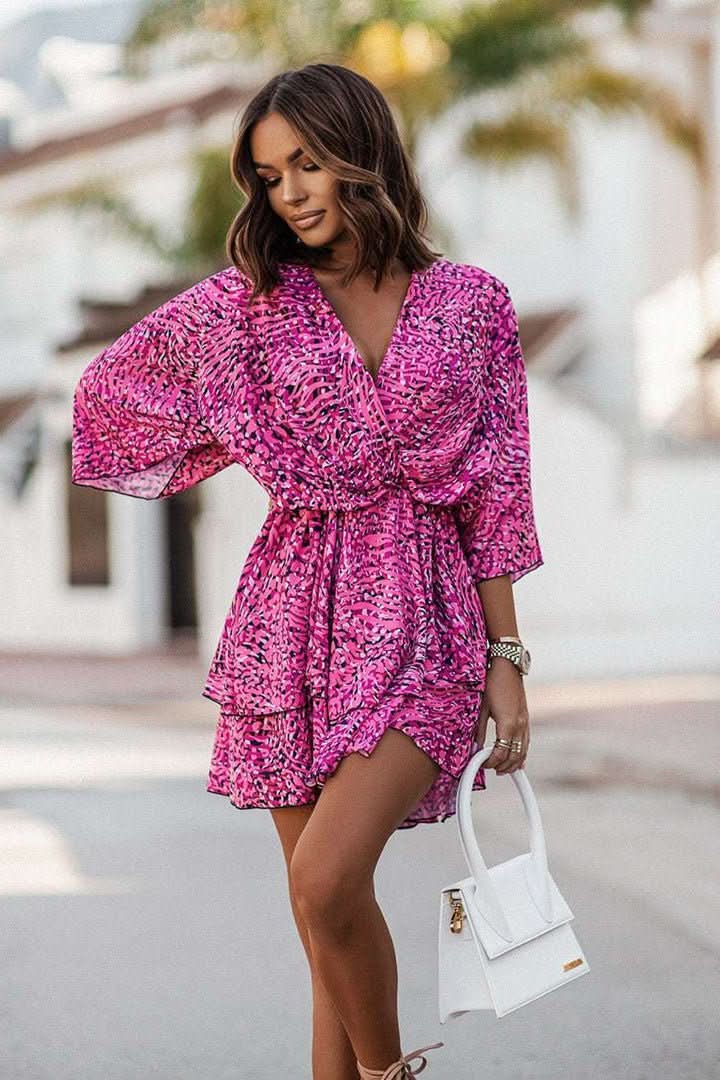 Elegant women's off-shoulder mini dress. Bohemian casual wear, perfect short summer outfit.