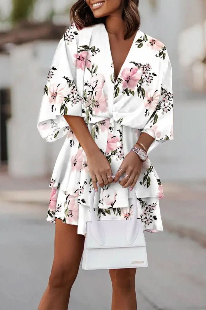 Casual women's short bohemian mini dress with an off-shoulder design. Great for summer parties.