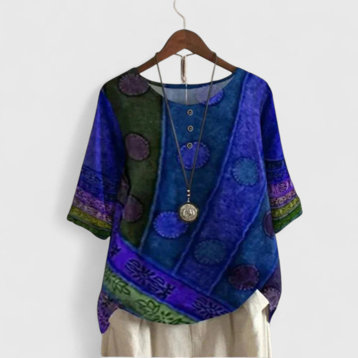 Stylish women's Bohemian loose fit short sleeve top with intricate patchwork, ideal for casual wear and summer travel.